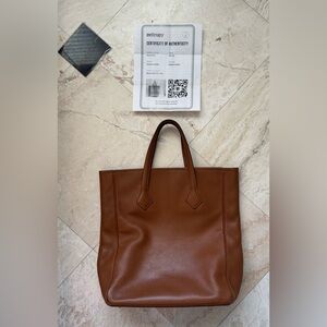 Hermes Tan Leather Tote Bag
Approx 16.5” high X 6”deep X 13” wide 6” strap drop
